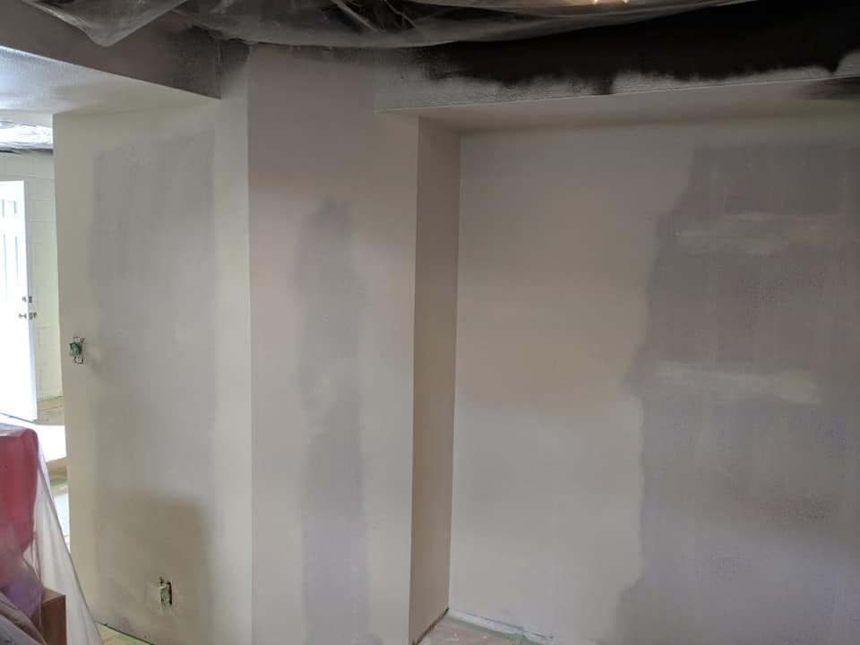 A wall taped and mudded, ready for texture