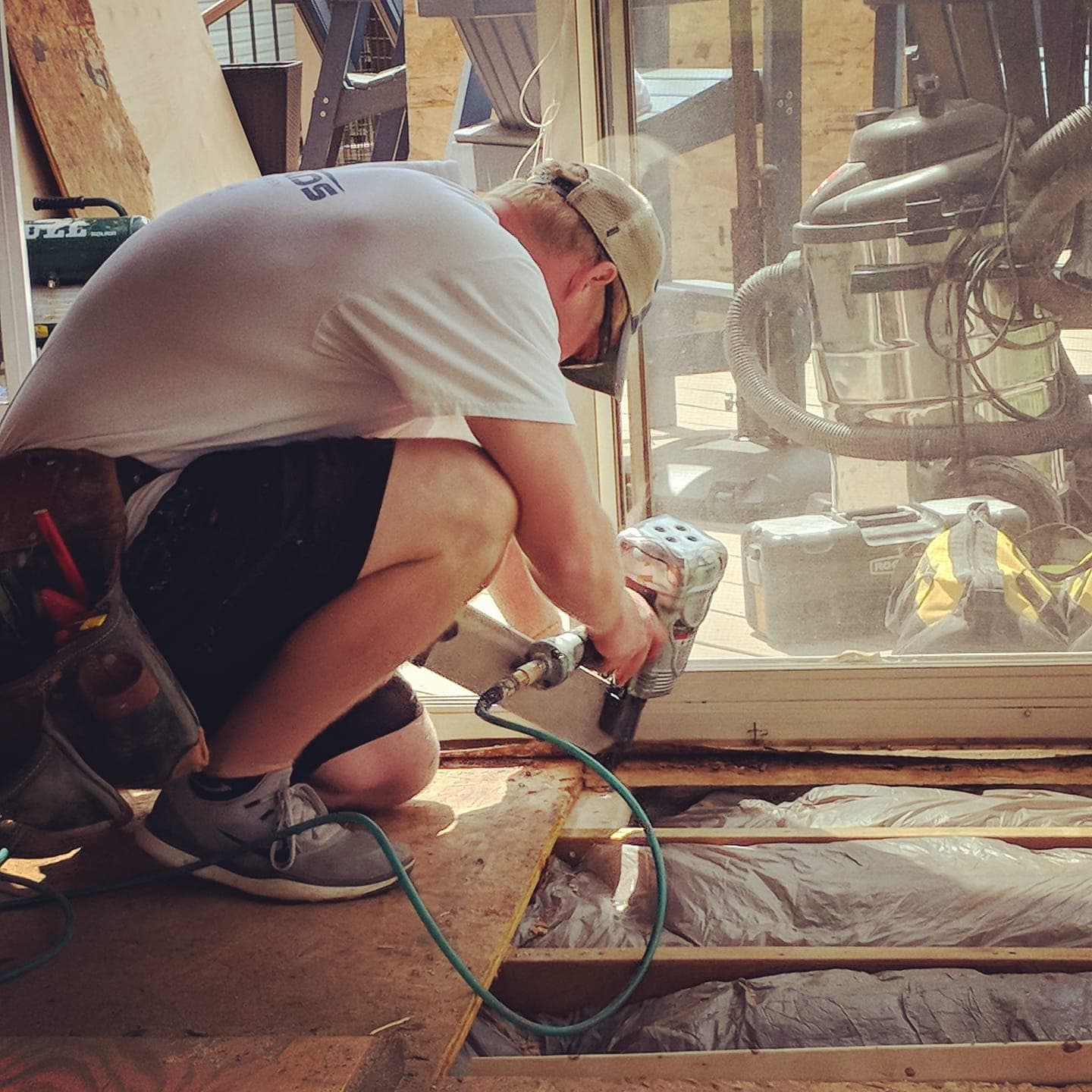Subfloor being nailed down before the finish floor goes on